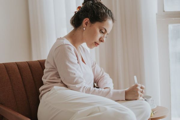Person enjoying a quiet morning with a peaceful expression
